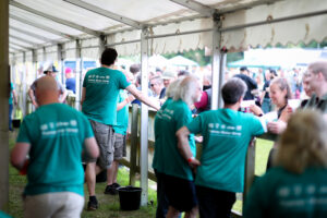 Volunteer shirts with logos at Bracknell Ale & Cider Festival.